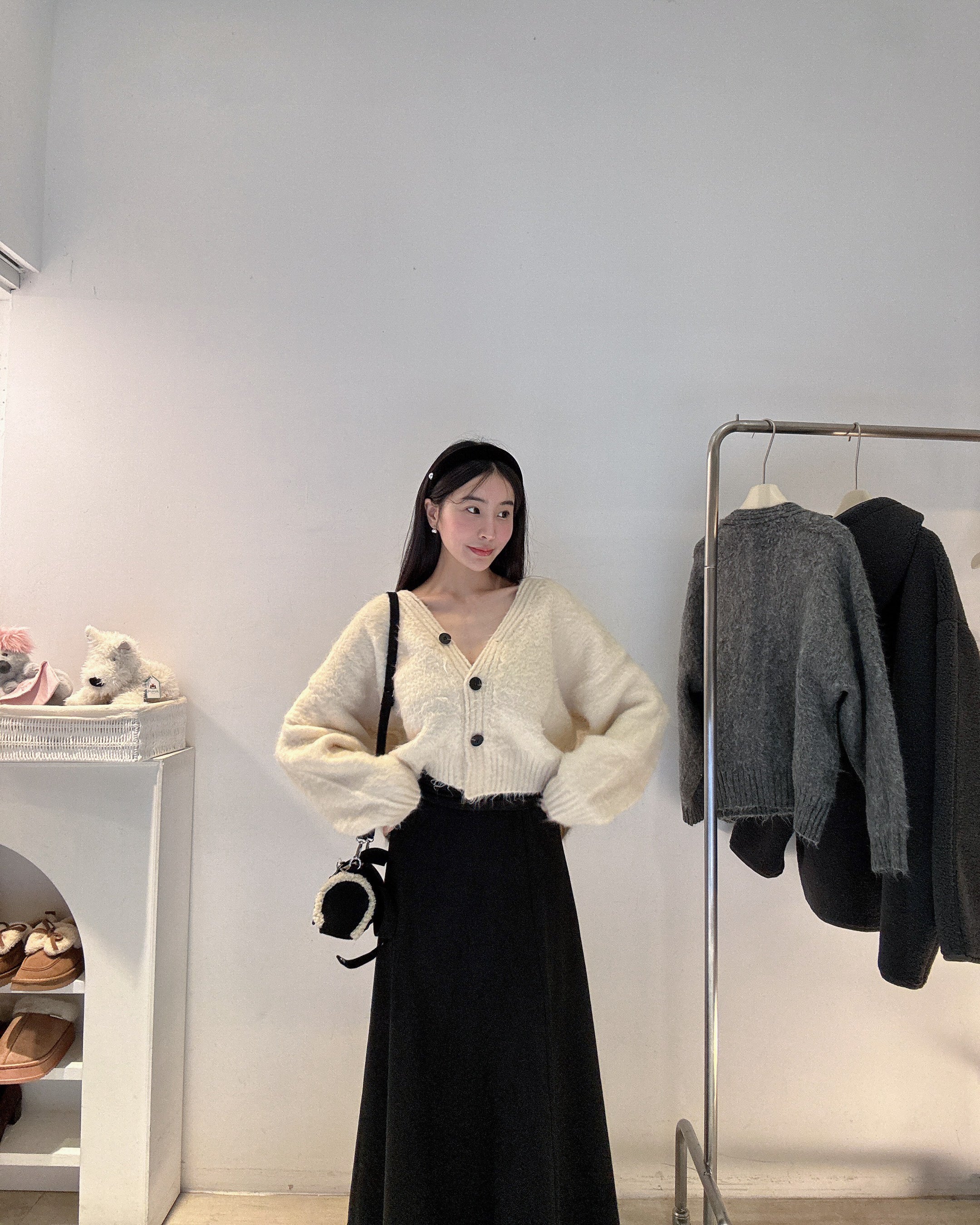 柔軟羊絨排扣針織衫