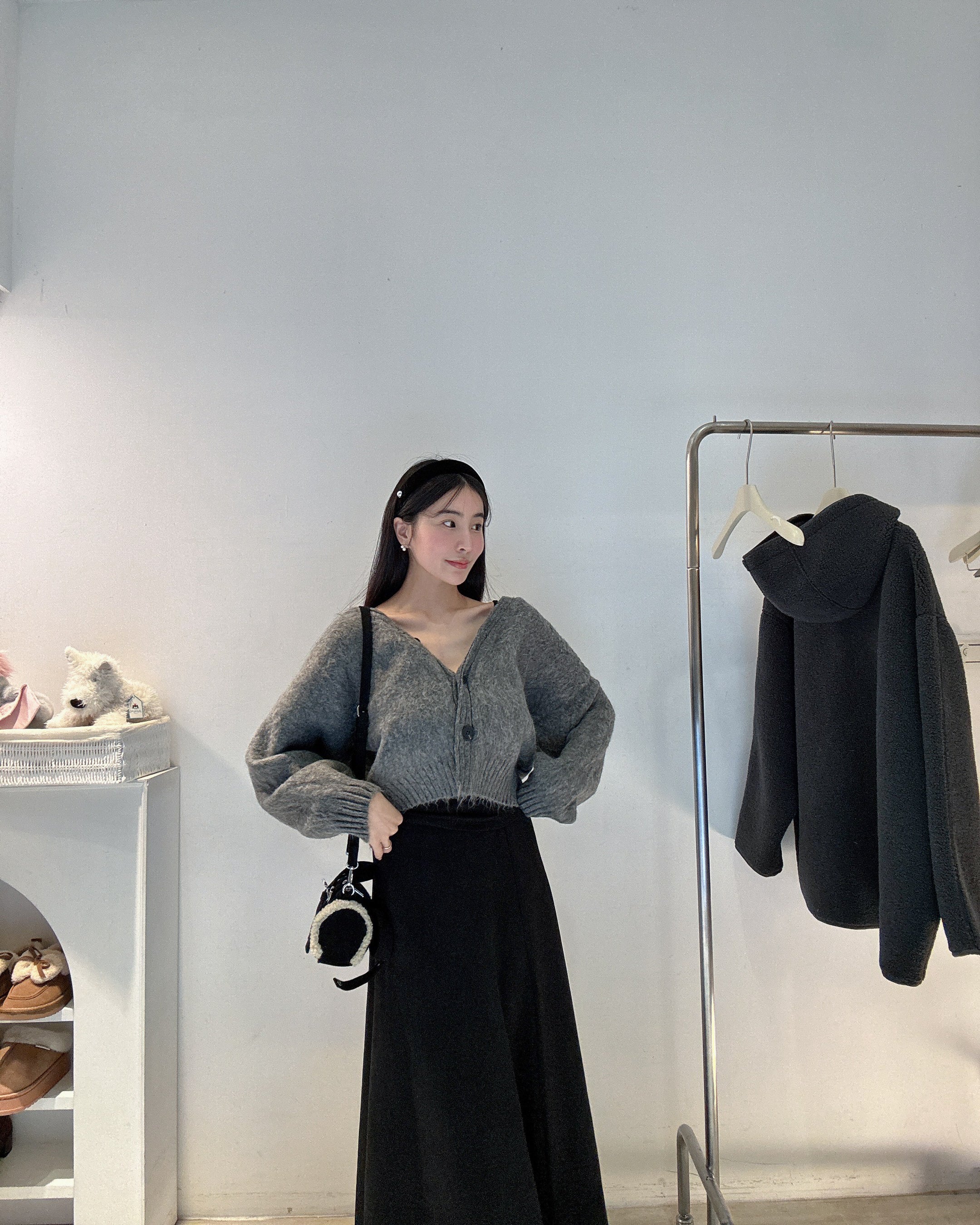 柔軟羊絨排扣針織衫