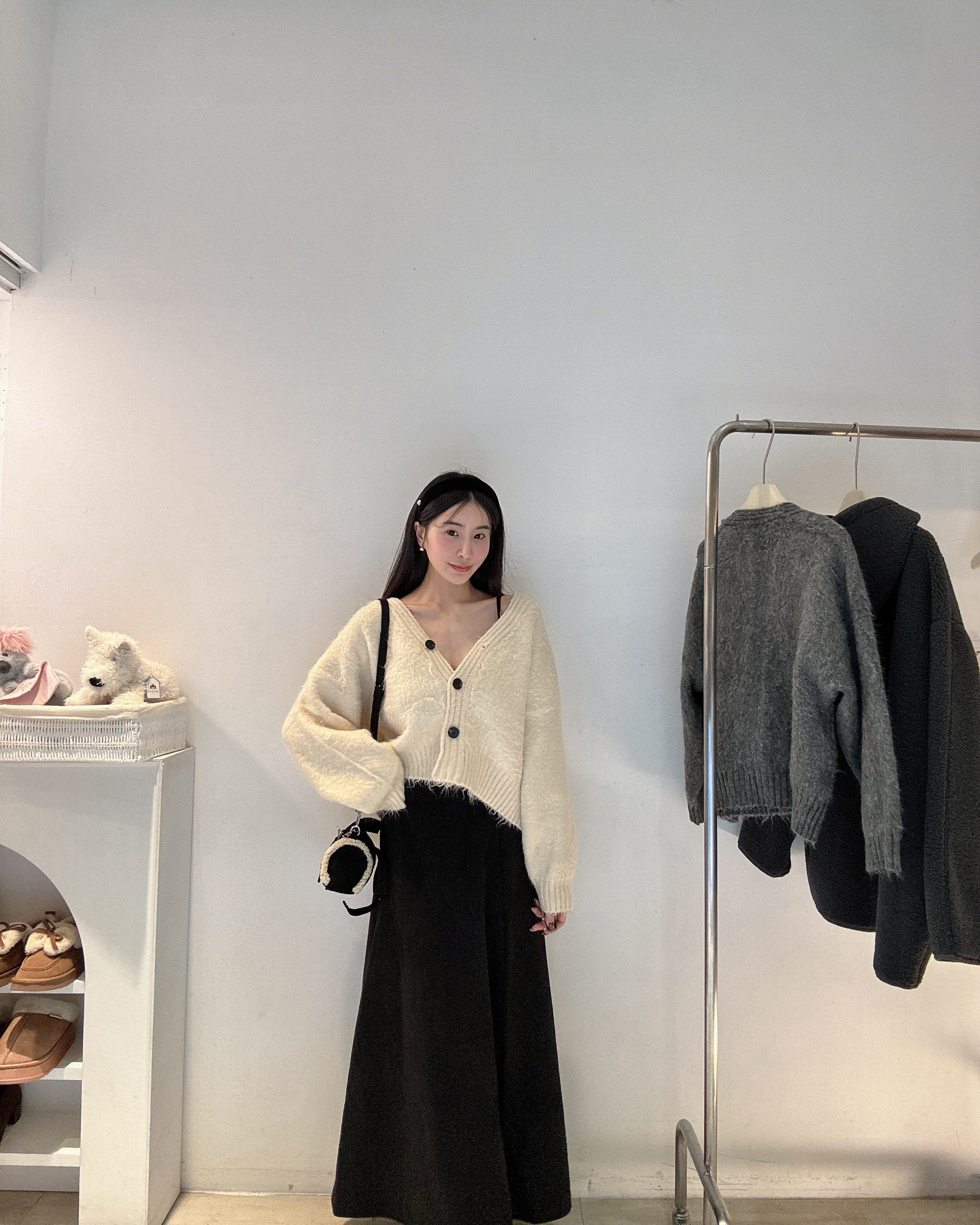 柔軟羊絨排扣針織衫