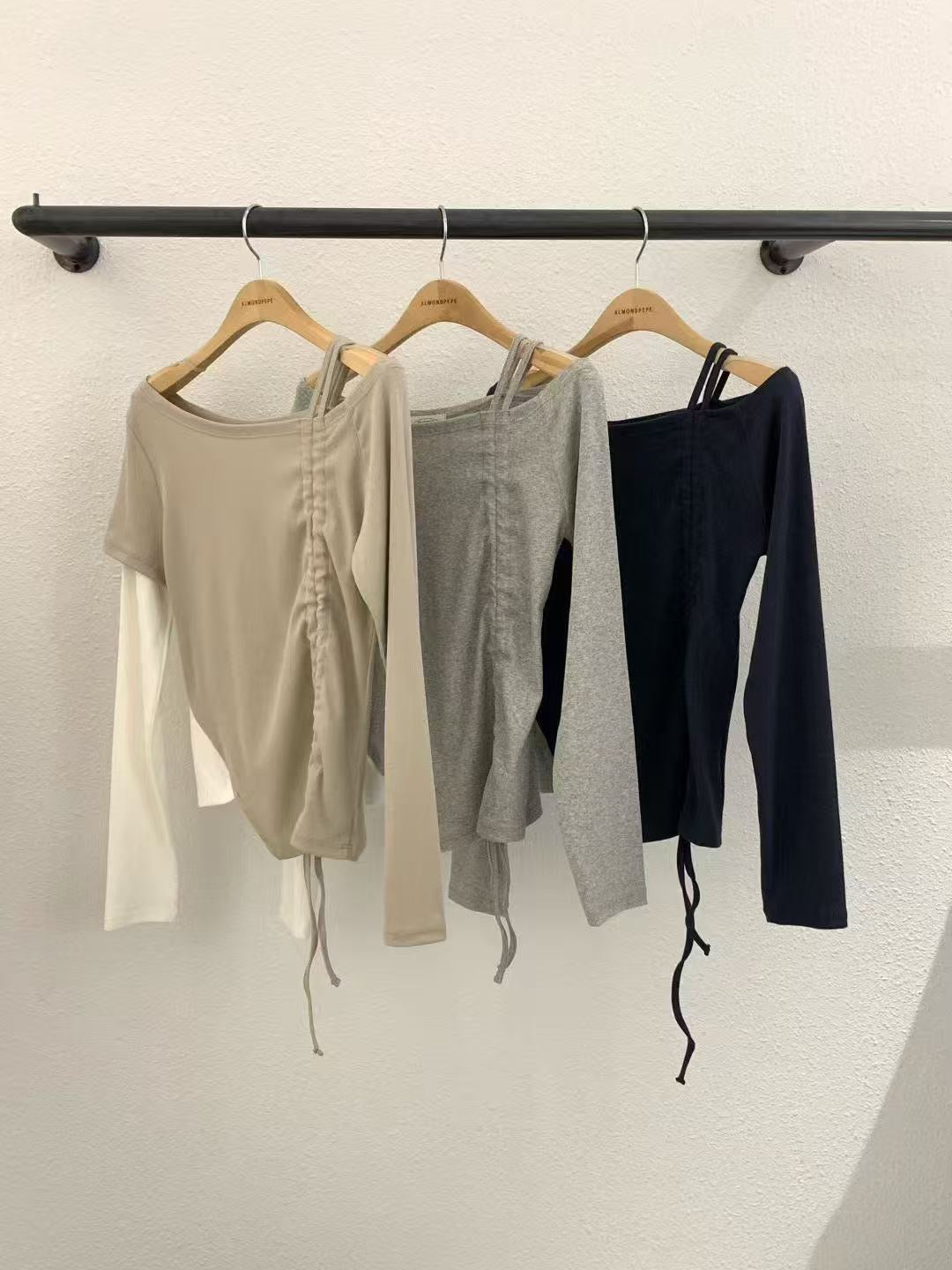 A12.設計感抽繩上衣